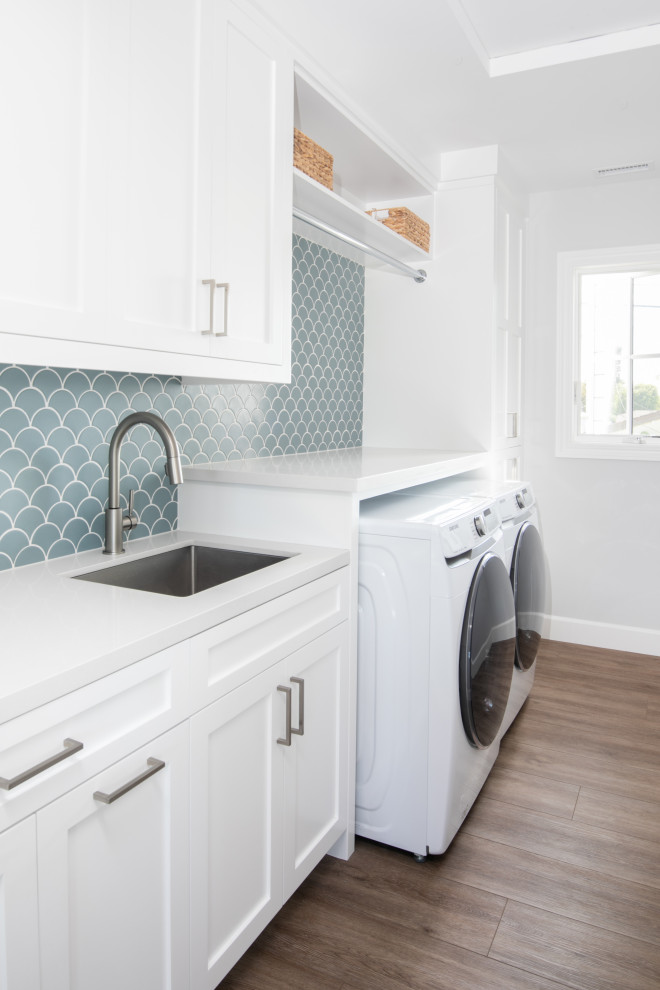 Photo of a beach style laundry room in Orange County.