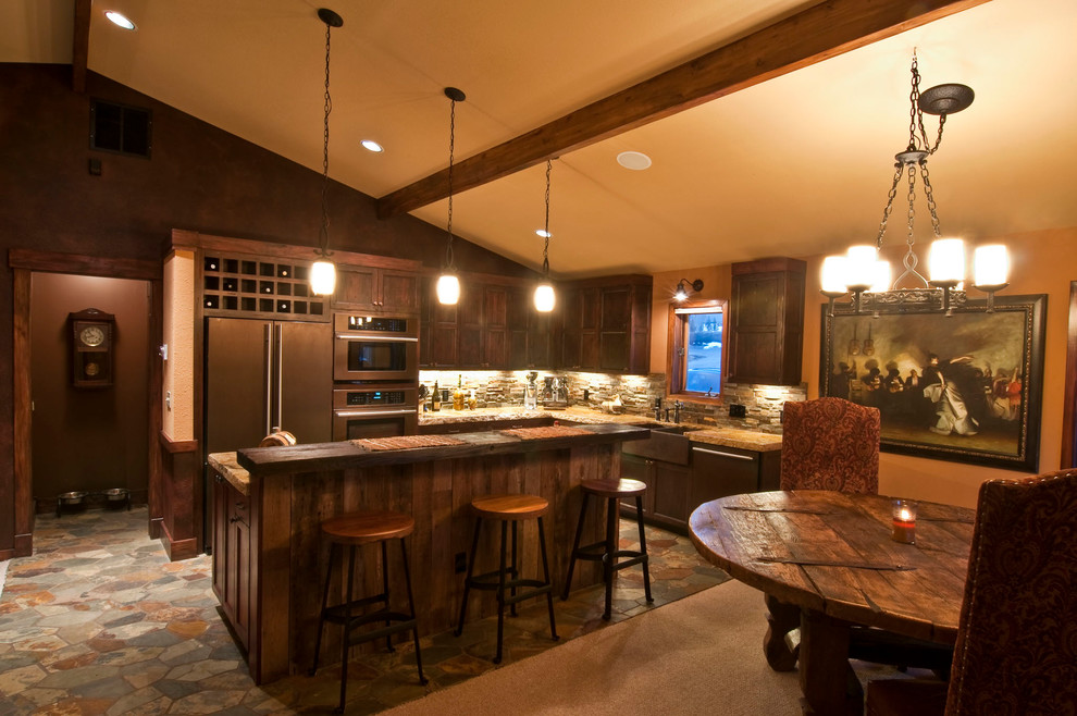 Example of a mid-sized mountain style slate floor kitchen/dining room combo design with brown walls