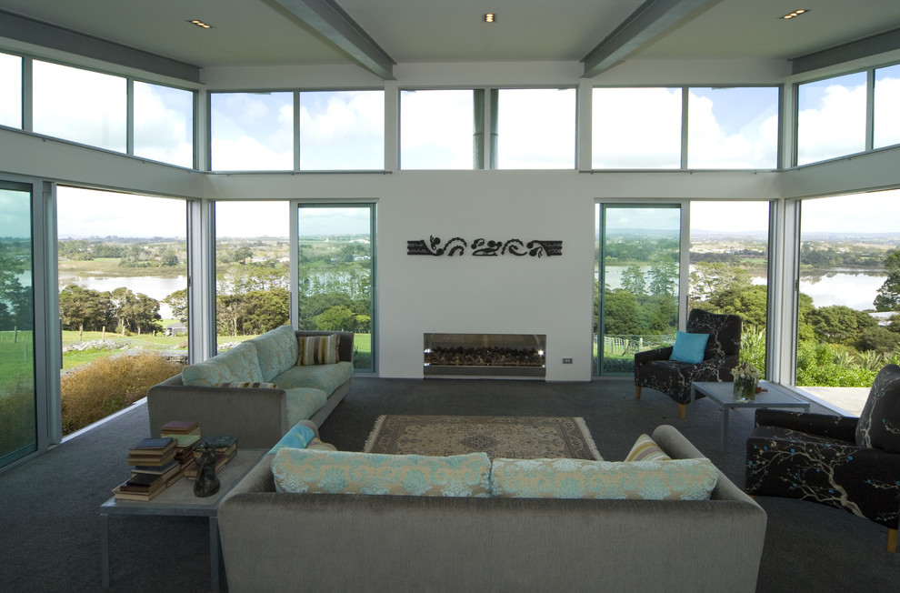 Design ideas for a contemporary living room in Auckland with white walls.