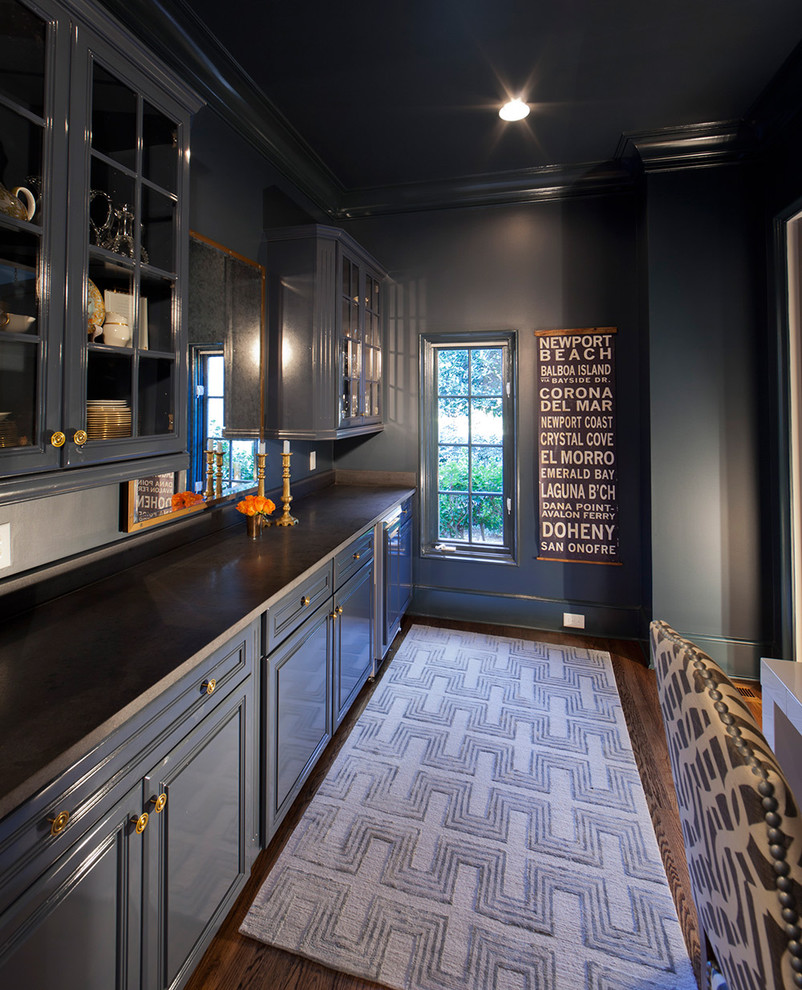 Design ideas for a traditional kitchen in Charlotte with blue cabinets.