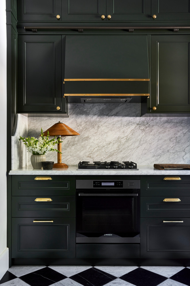 This is an example of a small transitional galley separate kitchen in Sydney with beaded inset cabinets, green cabinets, marble benchtops, white splashback, marble splashback, marble floors, multi-coloured floor and white benchtop.