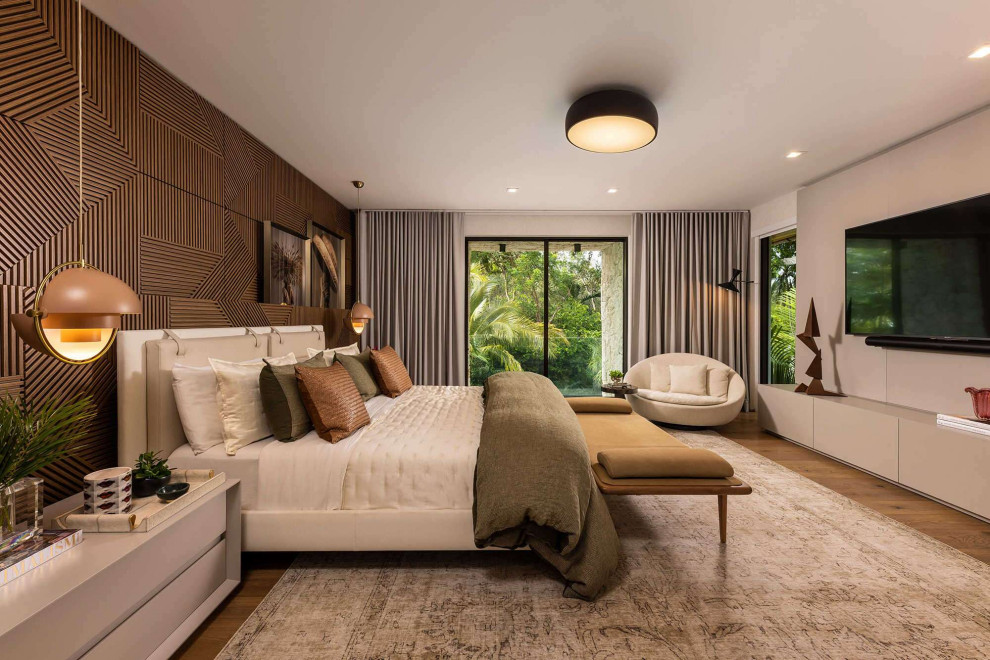 Example of a large trendy master bedroom design in Miami