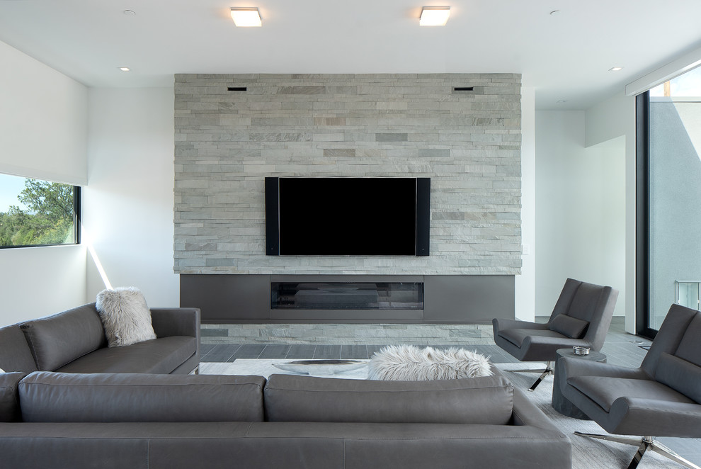 Inspiration for a mid-sized modern open concept living room in Phoenix with white walls, a ribbon fireplace, a metal fireplace surround and grey floor.