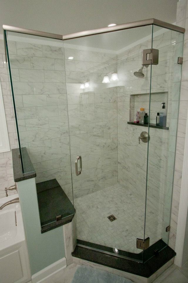 Photo of a traditional bathroom in Charleston with white tile and porcelain tile.