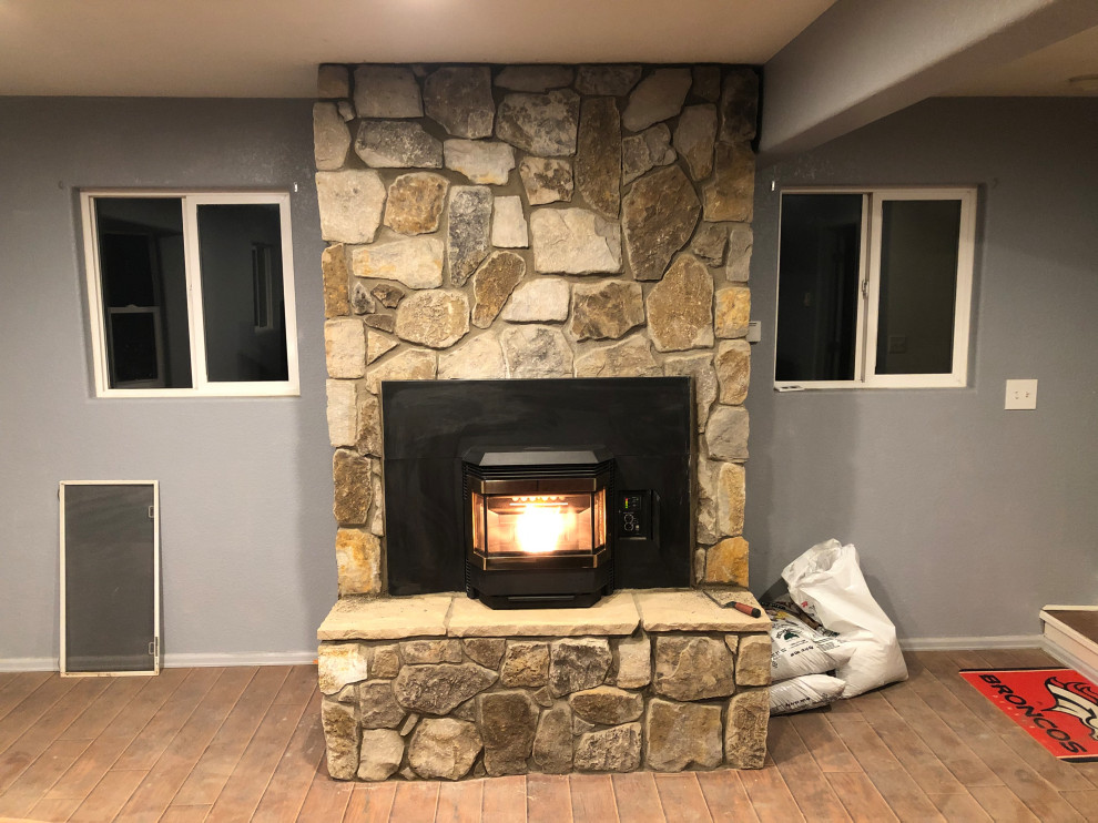 Pellet stove insert / Natural stone veneer Arts & Crafts Denver by Joshua's Construction