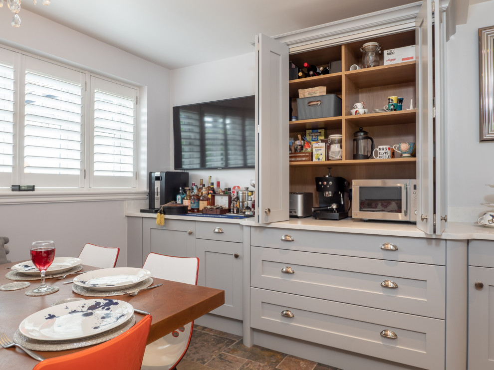 Design ideas for a medium sized traditional kitchen in Essex with an island.