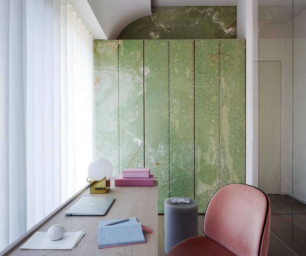 Photo of a contemporary study room in Paris with green walls, light hardwood floors, a freestanding desk, grey floor and vaulted.