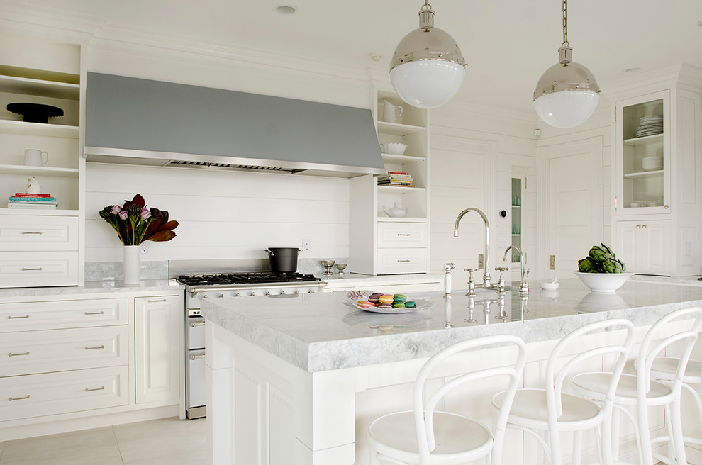 Large traditional eat-in kitchen in Boston with raised-panel cabinets, white cabinets and with island.