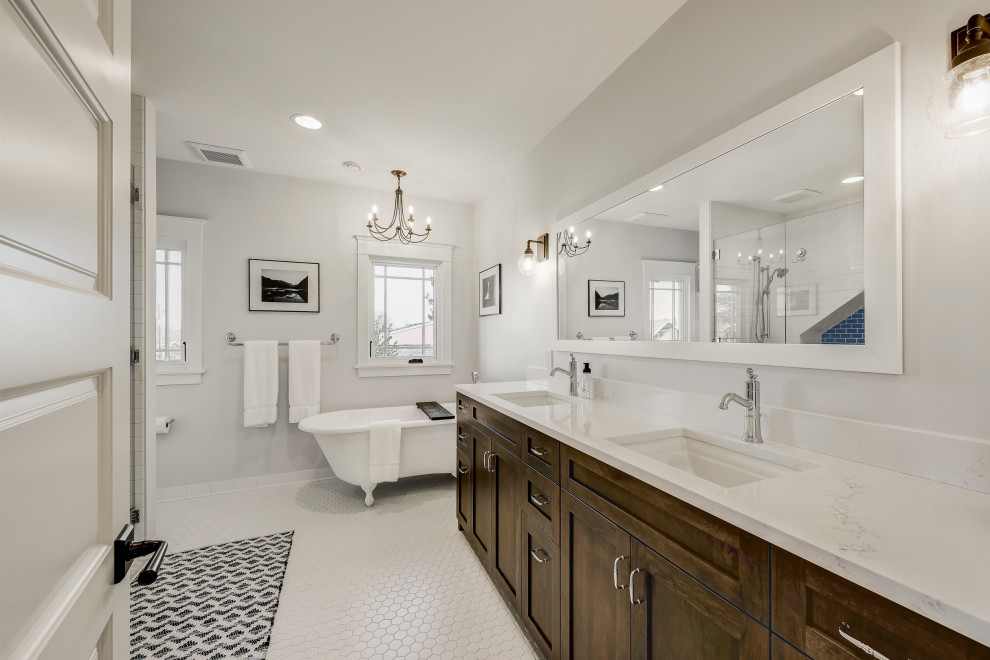 Large arts and crafts master bathroom in Seattle with shaker cabinets, dark wood cabinets, a claw-foot tub, white walls, ceramic floors, an undermount sink, engineered quartz benchtops, white floor, a hinged shower door, white benchtops, a double vanity, a built-in vanity and a double shower.