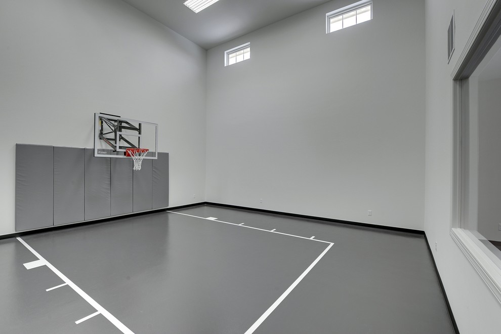 Design ideas for a large traditional indoor sport court in Minneapolis with white walls.
