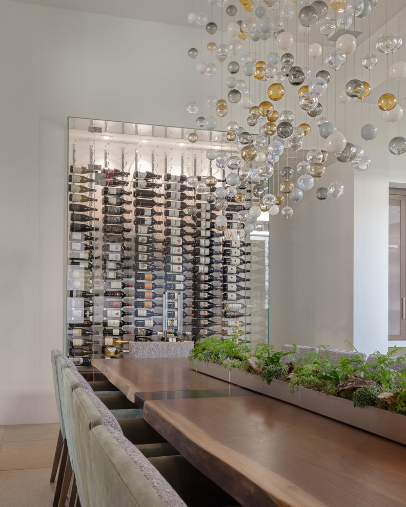 This is an example of a contemporary wine cellar in Sacramento with storage racks.