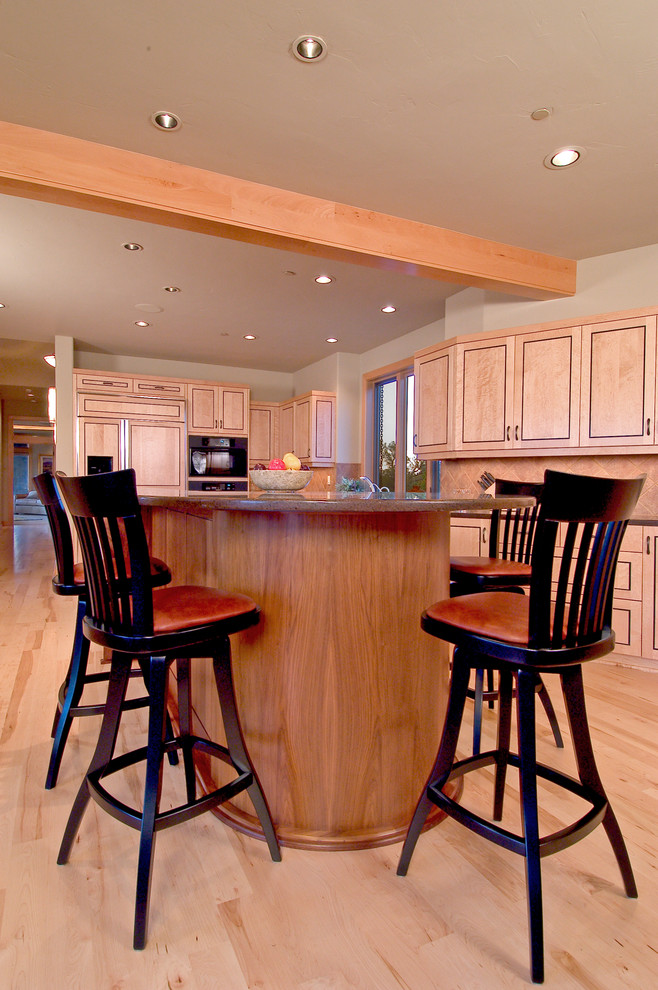 This is an example of a transitional kitchen in Portland.