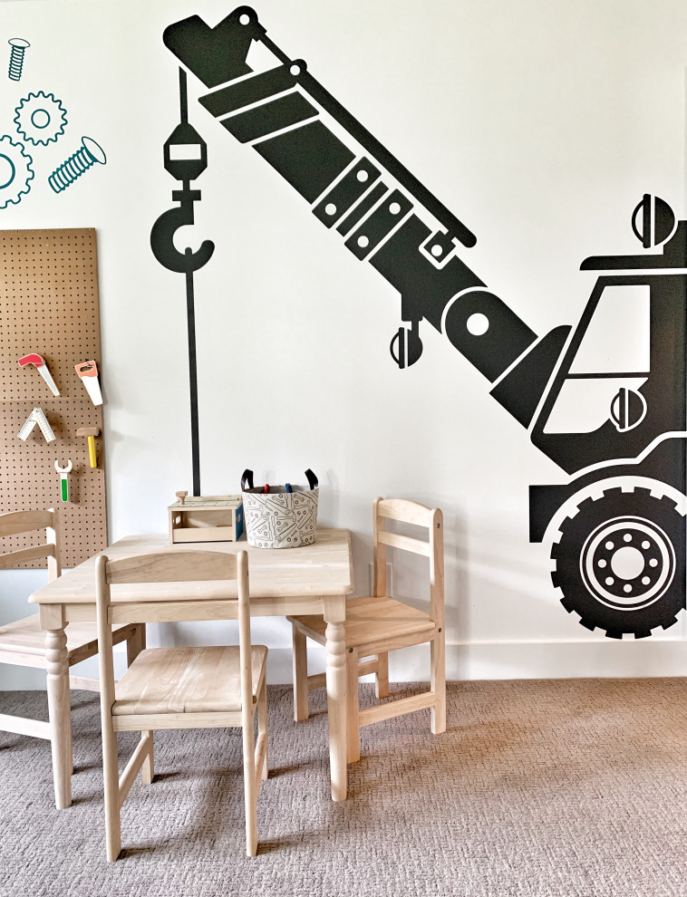 Inspiration for a country kids' playroom for kids 4-10 years old and boys with white walls, carpet and grey floor.