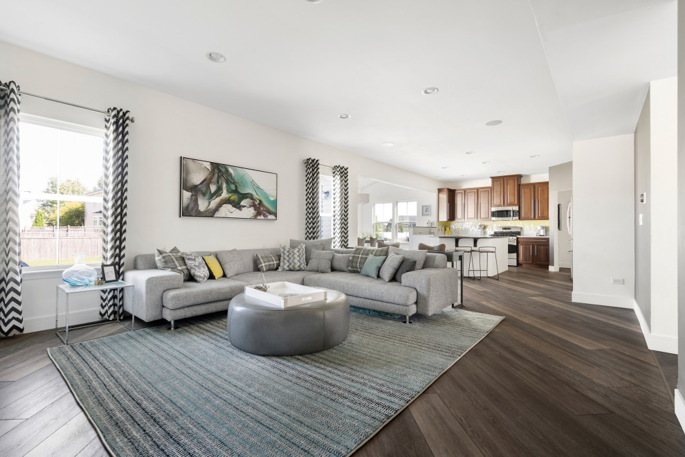 Large eclectic open concept vinyl floor and beige floor living room photo in Chicago with multicolored walls and a wall-mounted tv