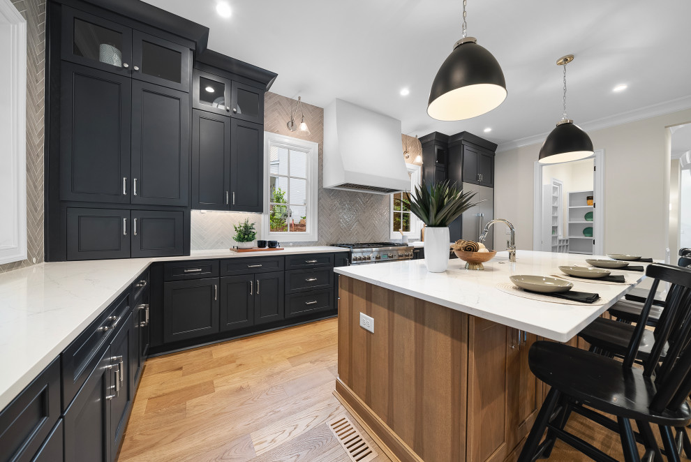 Example of a transitional kitchen design in Raleigh