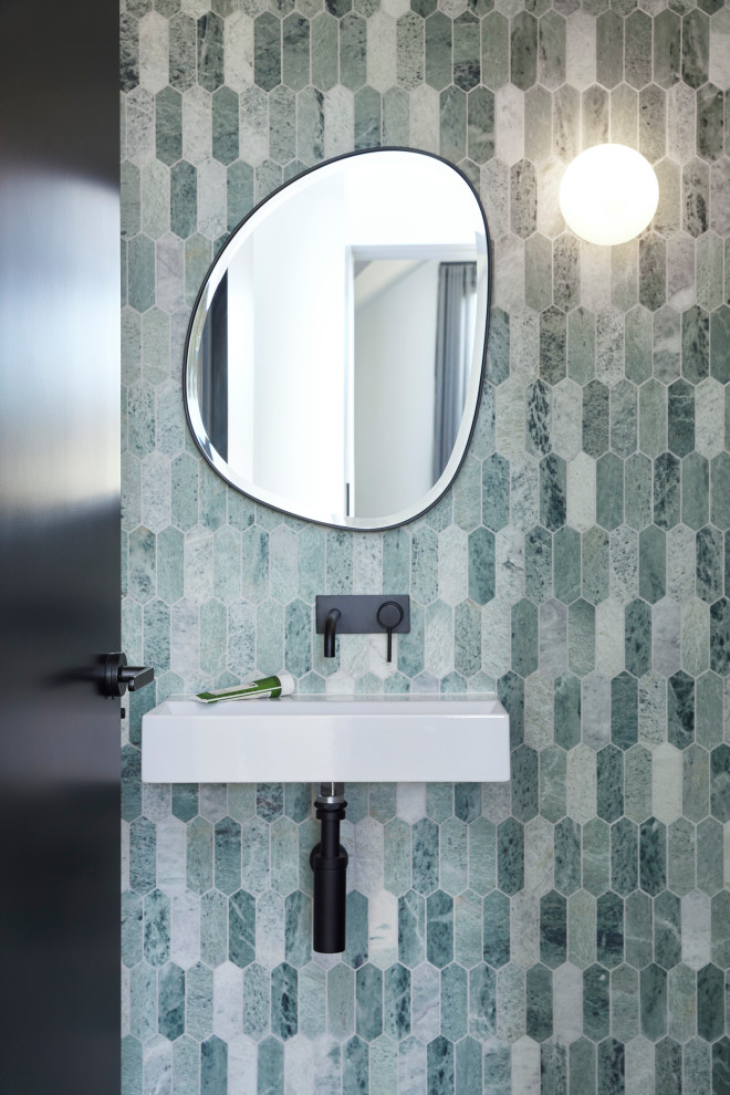 Photo of a contemporary powder room in Melbourne.