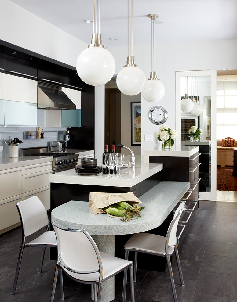 Design ideas for a transitional kitchen in New York with flat-panel cabinets, grey splashback and with island.