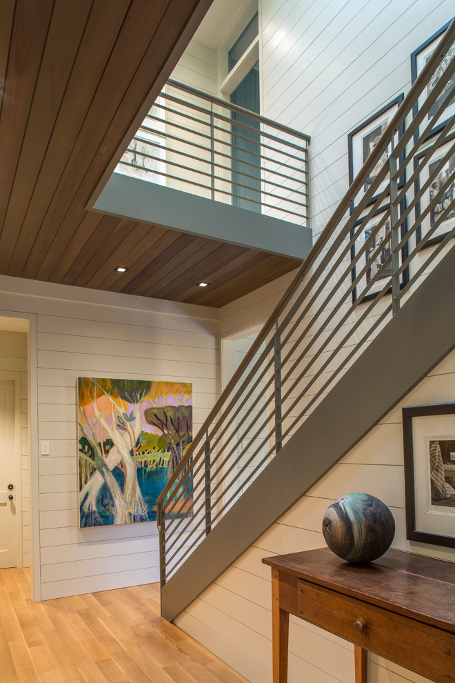 Photo of a large transitional staircase in Other.