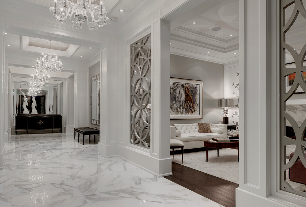 Inspiration for an expansive transitional foyer in Detroit with white walls and porcelain floors.