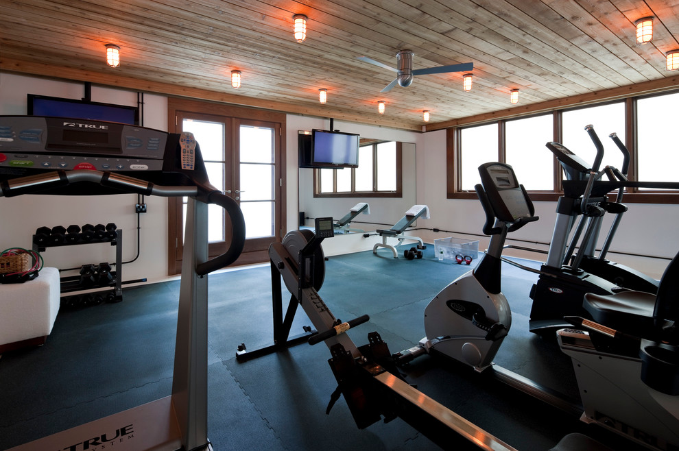 This is an example of a beach style home gym in New York.