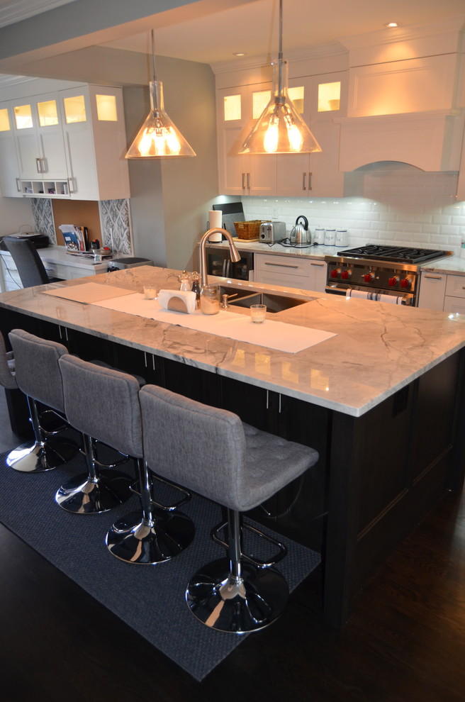 Example of a transitional kitchen design in Toronto