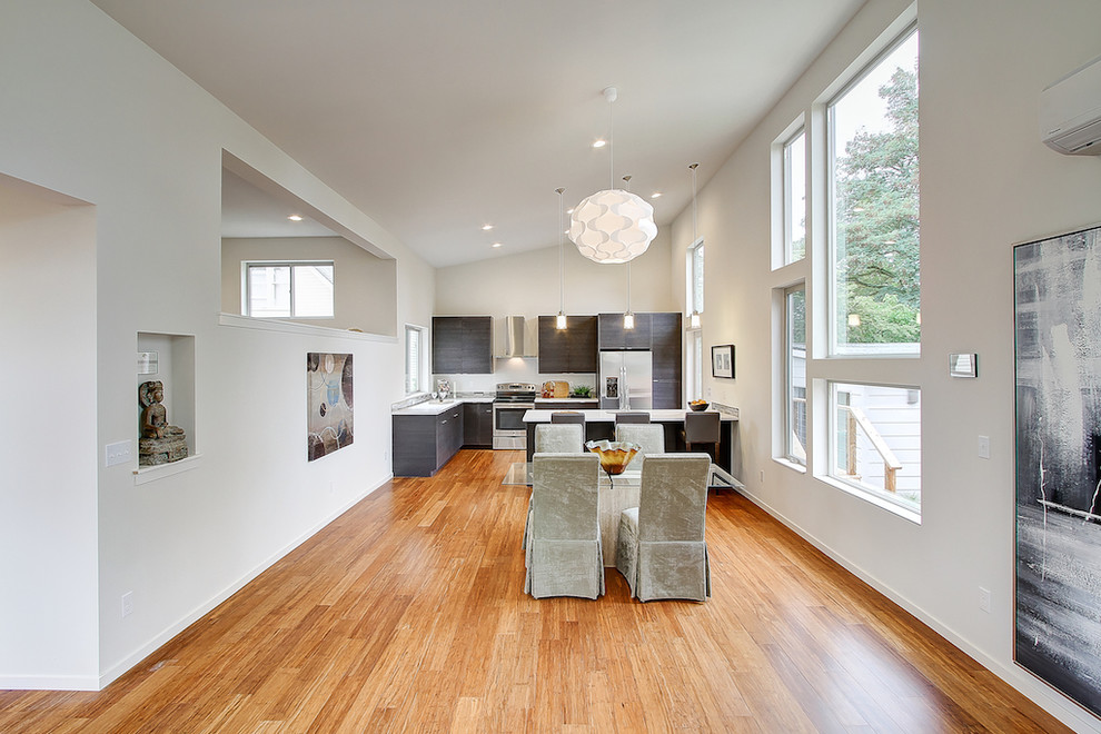 Example of a transitional dining room design in Seattle