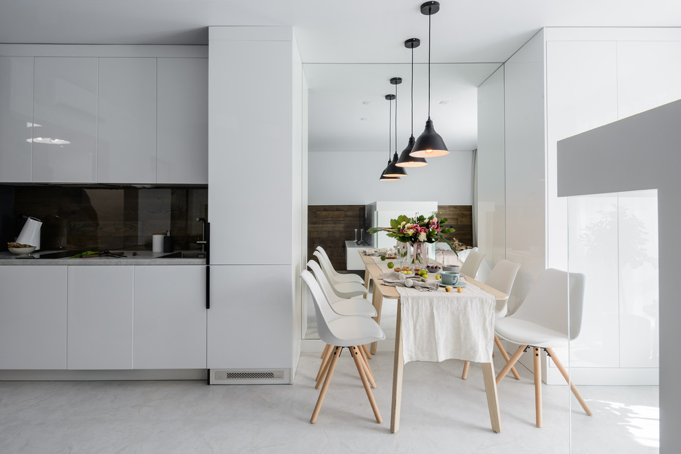 Inspiration for a mid-sized contemporary single-wall eat-in kitchen in Novosibirsk with an undermount sink, flat-panel cabinets, brown splashback, vinyl floors, no island, white floor, grey benchtop, glass sheet splashback and laminate benchtops.
