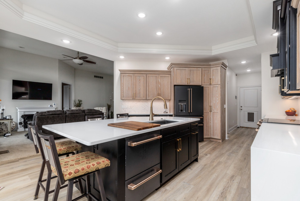 Open-Concept Kitchen with Matte Black Details and Gold Accents