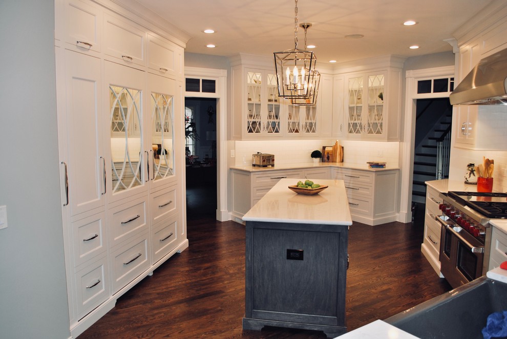 Home design - large transitional u-shaped home design idea in Chicago