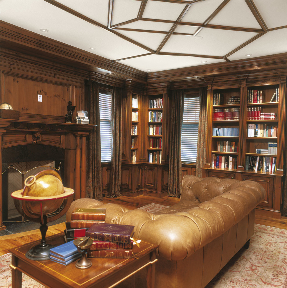 Design ideas for a large traditional study room in Boston with medium hardwood floors and a standard fireplace.