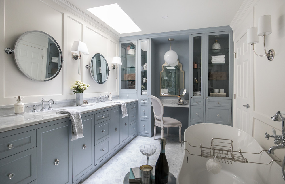 Example of a transitional bathroom design in Calgary