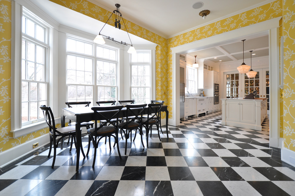 Large traditional separate dining room in New York with yellow walls, marble floors, no fireplace and multi-coloured floor.