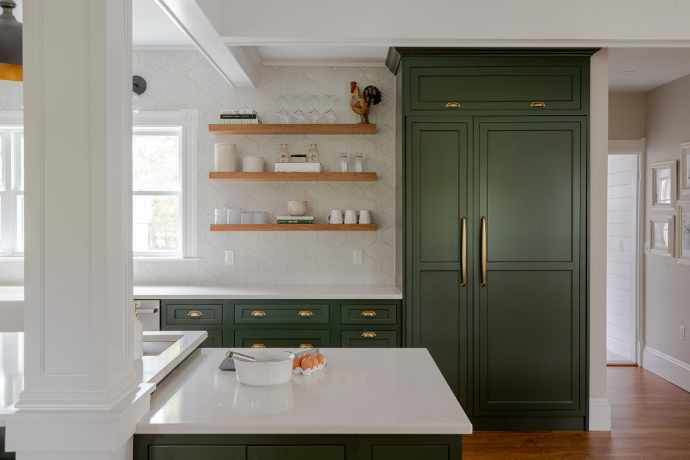 Inspiration for a huge transitional medium tone wood floor and brown floor eat-in kitchen remodel in Boston with a farmhouse sink, shaker cabinets, green cabinets, quartz countertops, beige backsplash, an island and white countertops