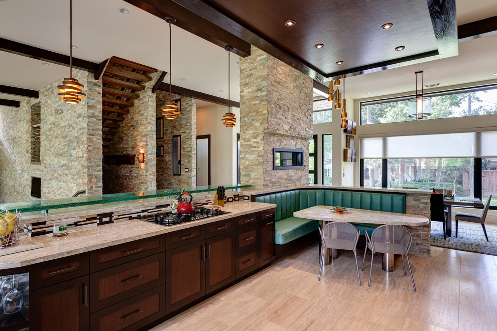 Photo of a contemporary kitchen in Austin with shaker cabinets, dark wood cabinets and beige floor.
