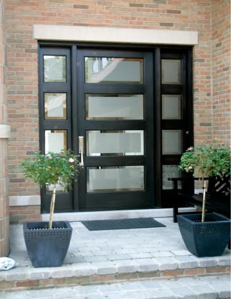 Inspiration for a mid-sized modern front door in Detroit with a single front door and a black front door.