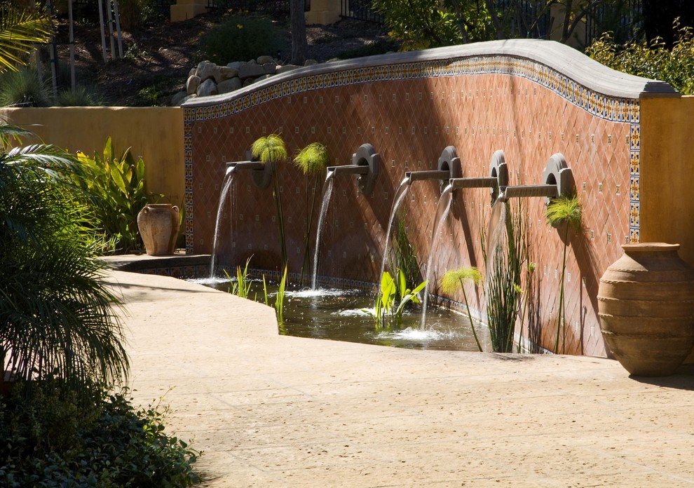 Inspiration for a mediterranean garden in Santa Barbara with a water feature.