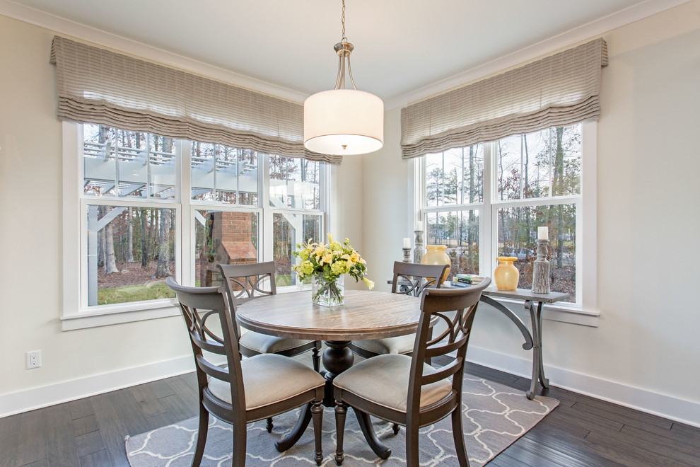 Photo of a beach style dining room in Richmond with grey walls and dark hardwood floors.