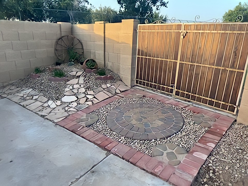 Design ideas for a small southwestern drought-tolerant, desert and full sun backyard landscaping in Phoenix.