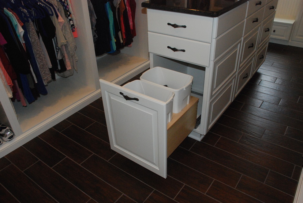 Large traditional women's dressing room in Cleveland with open cabinets, white cabinets and ceramic floors.