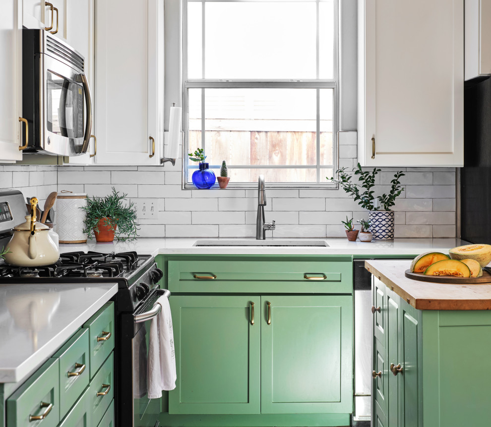 Inspiration for a mid-sized country kitchen in Austin with shaker cabinets, with island and green benchtop.