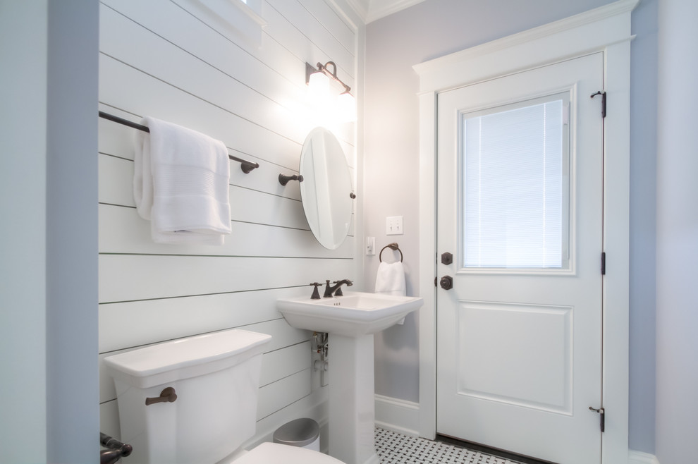 This is an example of a beach style powder room in Philadelphia.
