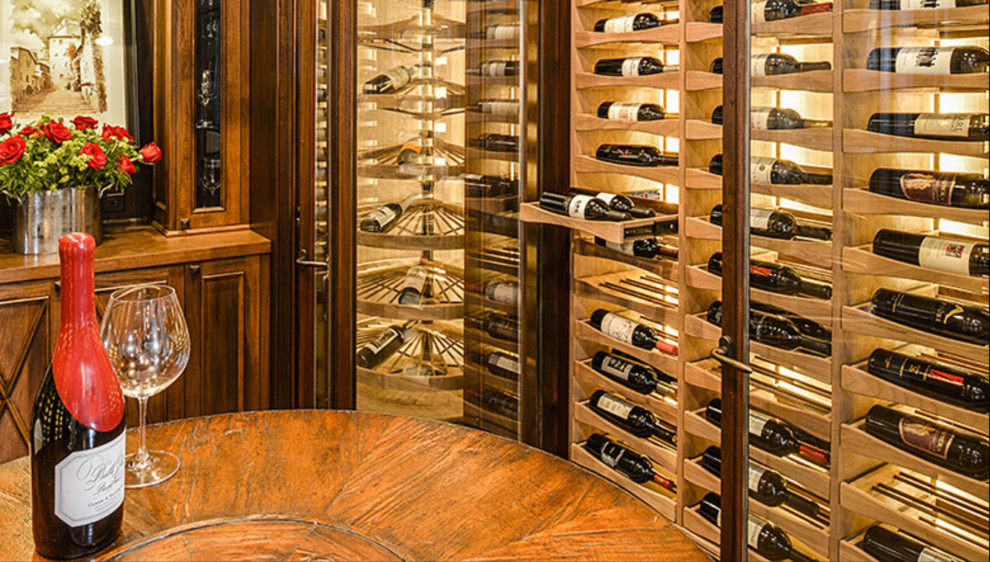 Inspiration for a large transitional wine cellar in Other with medium hardwood floors, display racks and brown floor.