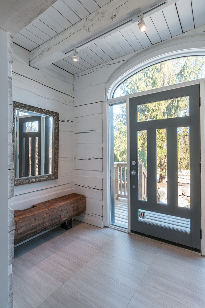 Example of a transitional home design design in Toronto