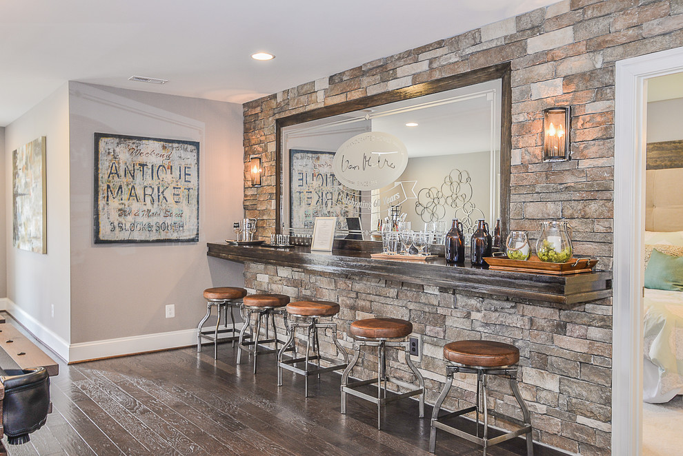 Design ideas for a mid-sized transitional home bar in DC Metro with dark hardwood floors.