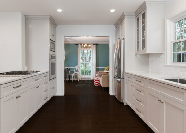 Inspiration for a large transitional l-shaped open concept kitchen remodel with shaker cabinets and a peninsula