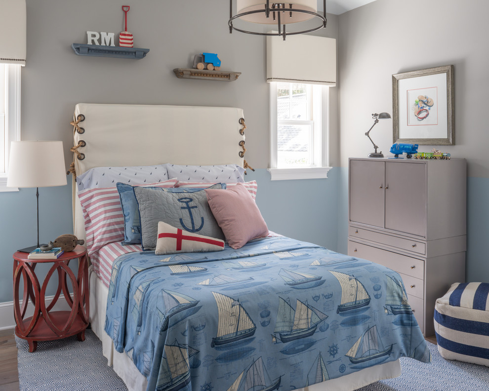 Photo of a beach style gender-neutral kids' bedroom for kids 4-10 years old in Atlanta with multi-coloured walls.