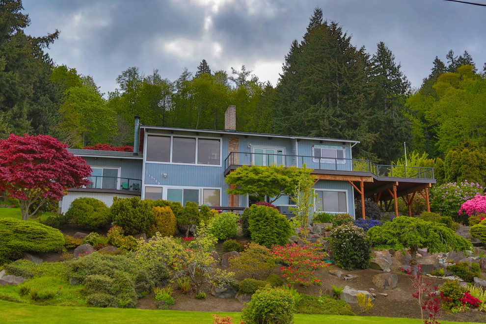 Deck - large coastal side yard deck idea in Seattle