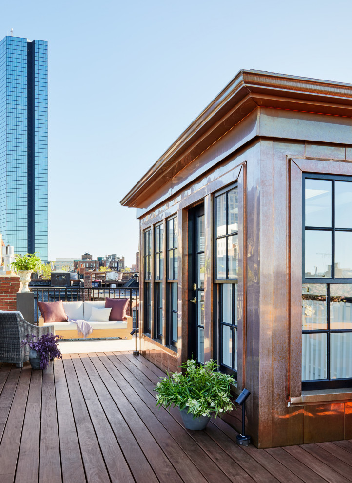 Photo of a transitional rooftop deck in Boston.