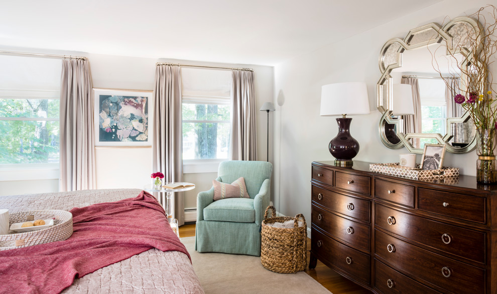 This is an example of a mid-sized transitional master bedroom in Boston with grey walls.