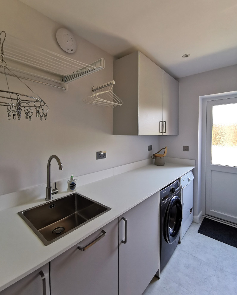 This is an example of a scandinavian laundry room in Hertfordshire.